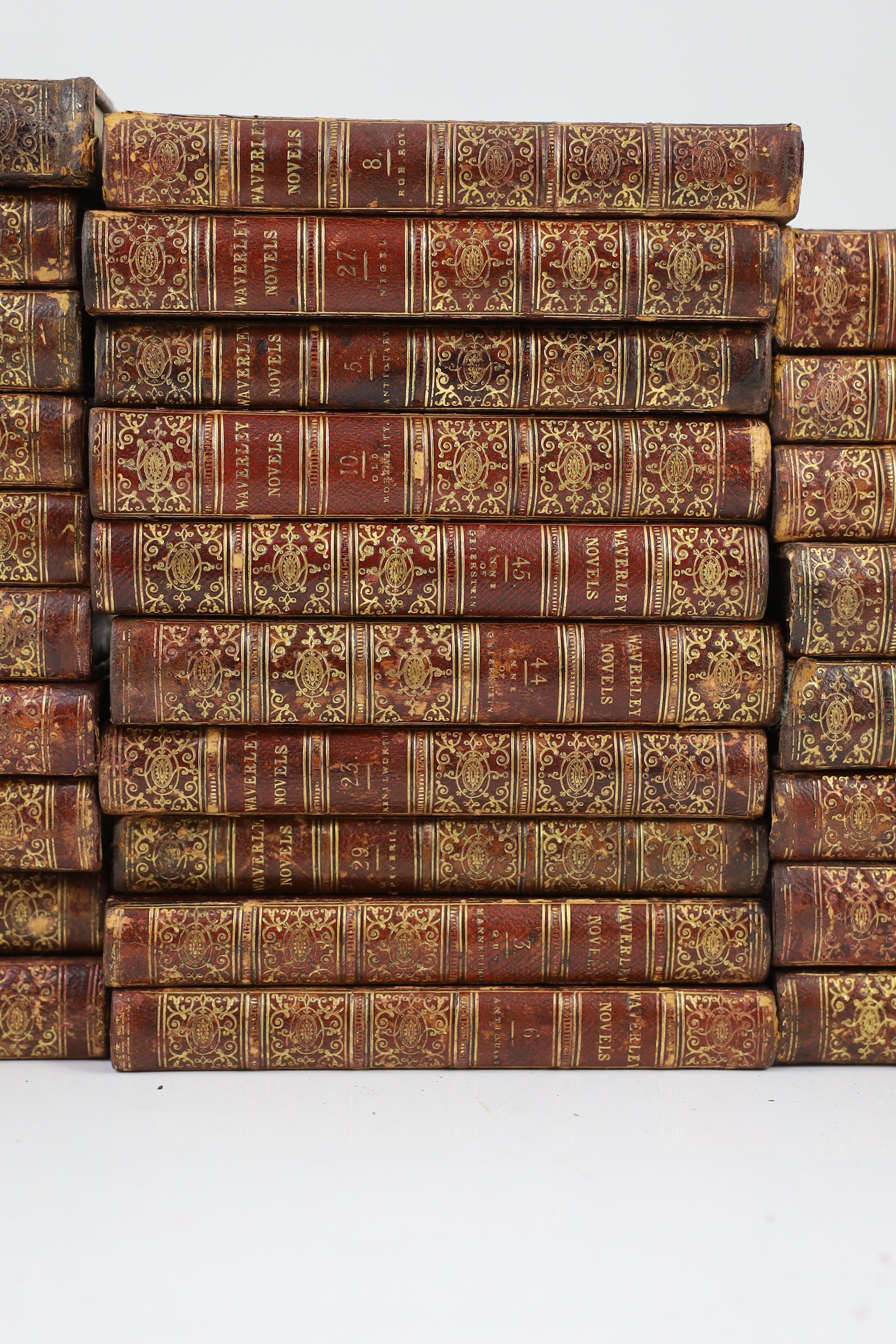 Scott, Sir Walker - Waverley Novels, 48 vols., engraved pictorial and printed titles, frontispieces; contemp. gilt-decorated maroon half morocco and marbled boards with panelled spines, marbled edges and e/ps., sm.8vo. E